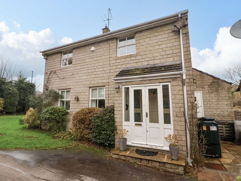 A house exterior with plants and a pathway at Lair Close House Harrogate
