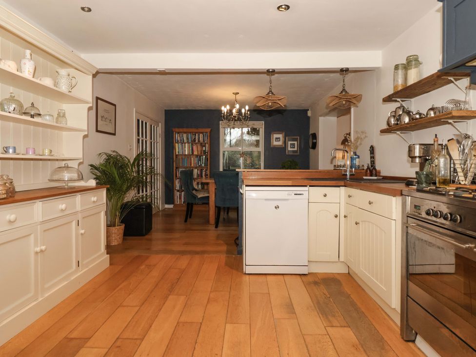 A kitchen with appliances and cabinetry at Lair Close House in Harrogate