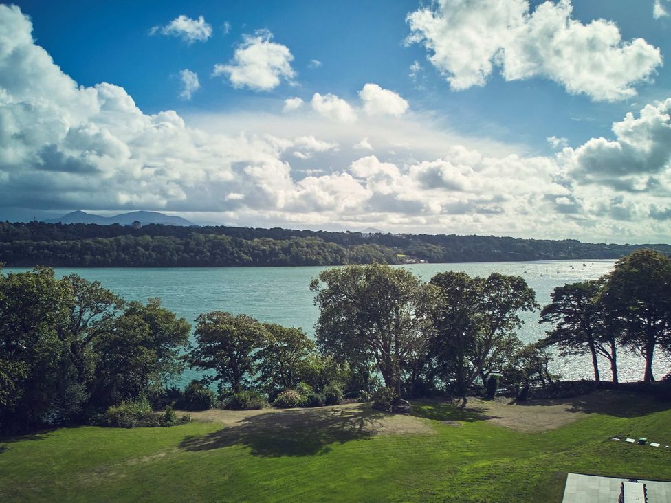 A view of water and trees at Craig y Don in Glyngarth near Llandegfan