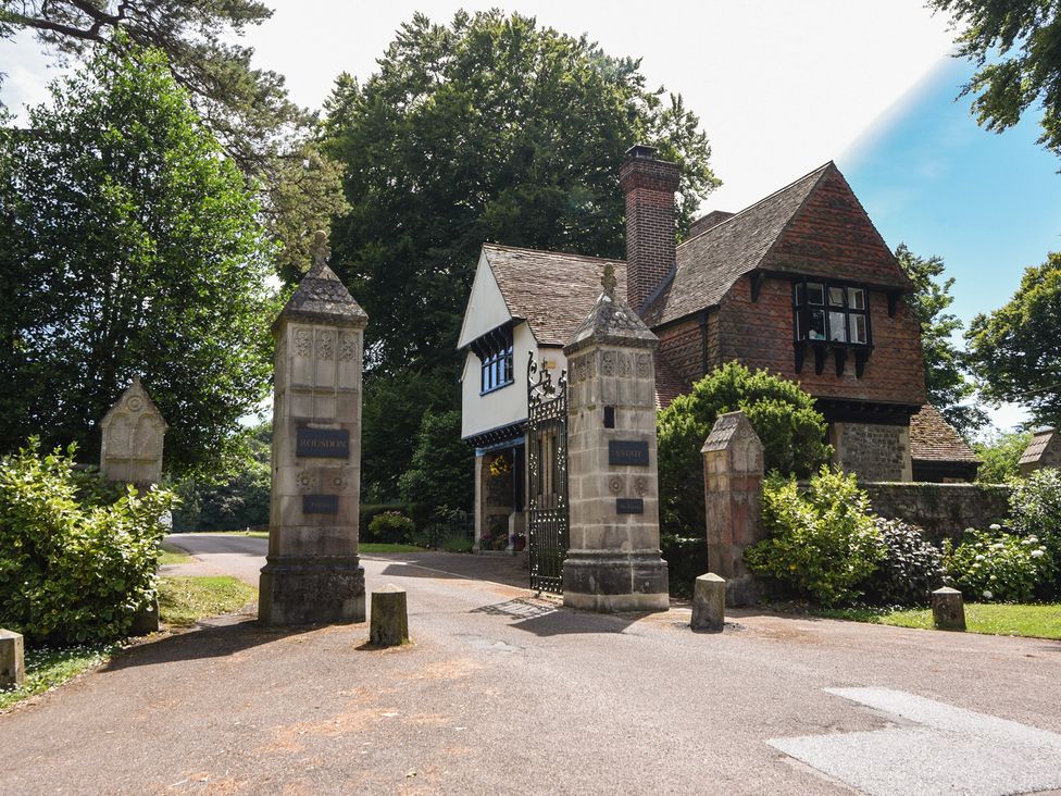 A house with gate and stone pillars at The Clock Tower in Rousdon, Nr Lyme Regis