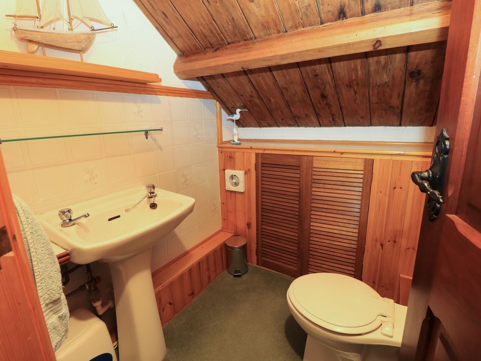A bathroom with a sink and toilet at The Chapel in Northwood, Isle Of Wight