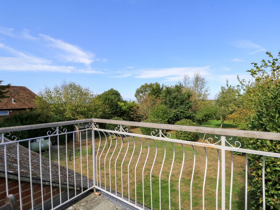 An outdoor balcony view overlooking a garden at The Chapel in Northwood, Isle Of Wight