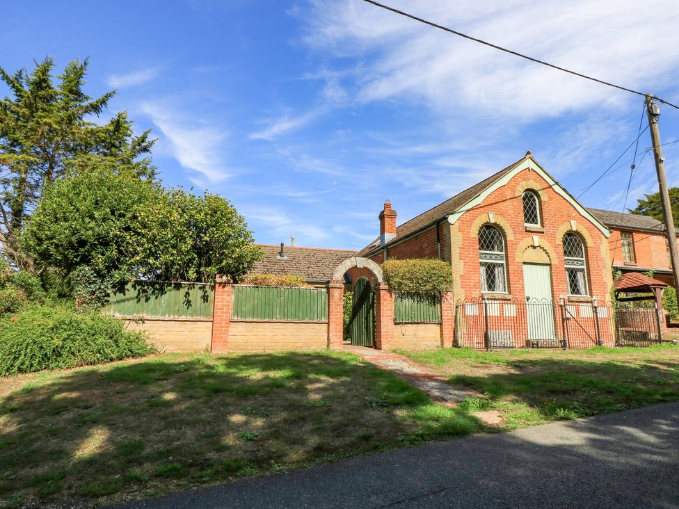 A house with a fence and pathway at The Chapel in Northwood, Isle Of Wight
