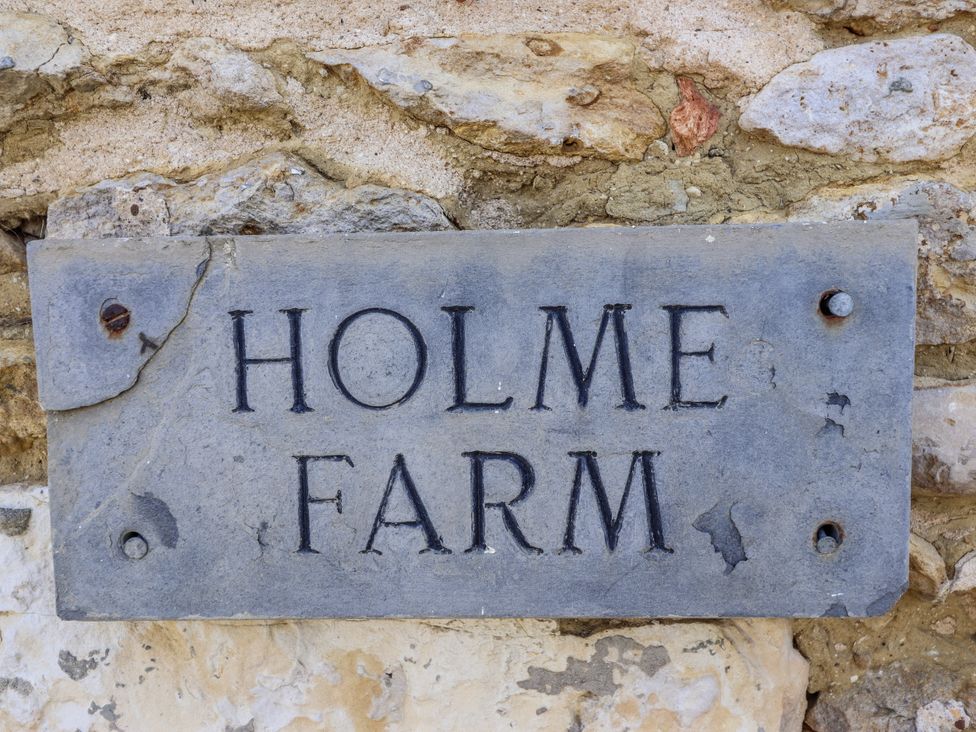 A sign reading Holme Farm at Holme Farm in Ruskington