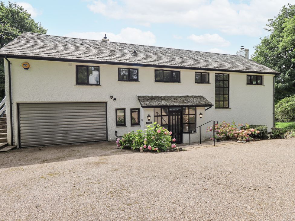 A house with a garage and garden at Rowanhill in Kendal