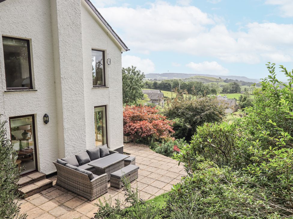A patio with seating at Rowanhill in Kendal