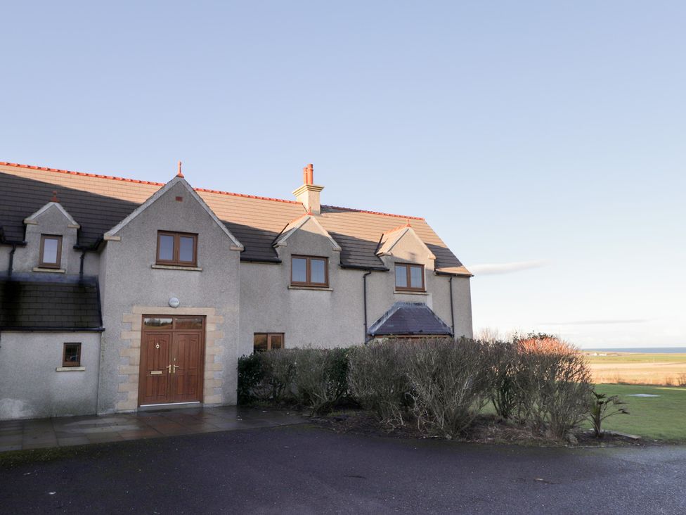 A house with a front door and windows at Northbanks House in Thurso