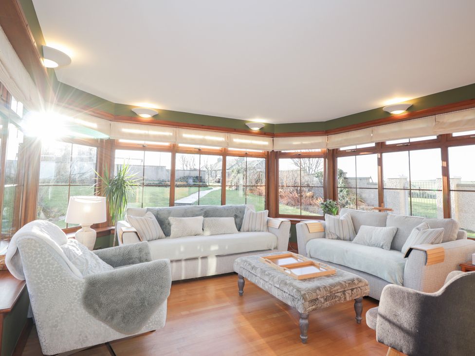 A living room with sofas and a coffee table at Northbanks House in Thurso