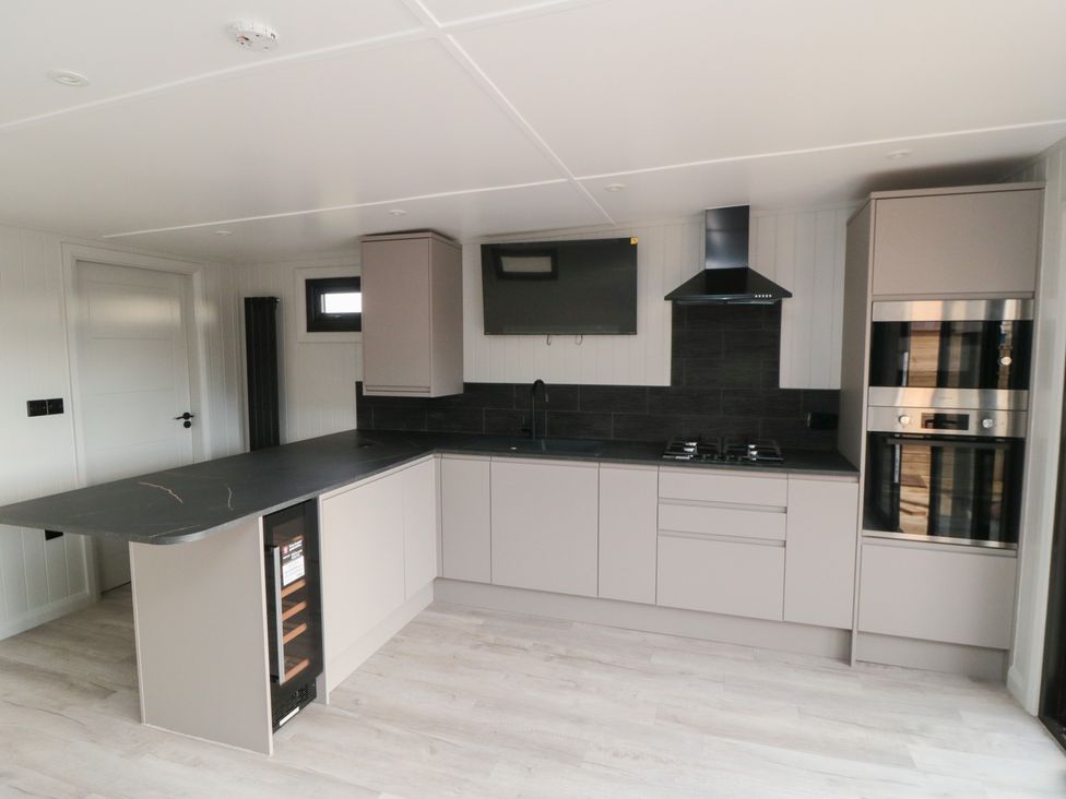 A kitchen with sink and appliances at Lodge 1 Yarm