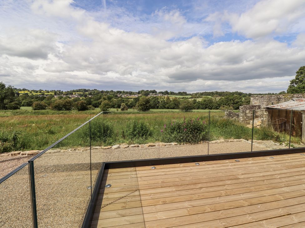 An outdoor area with a wooden deck and a view of land at West Dunkirk Hemmels in Hexham