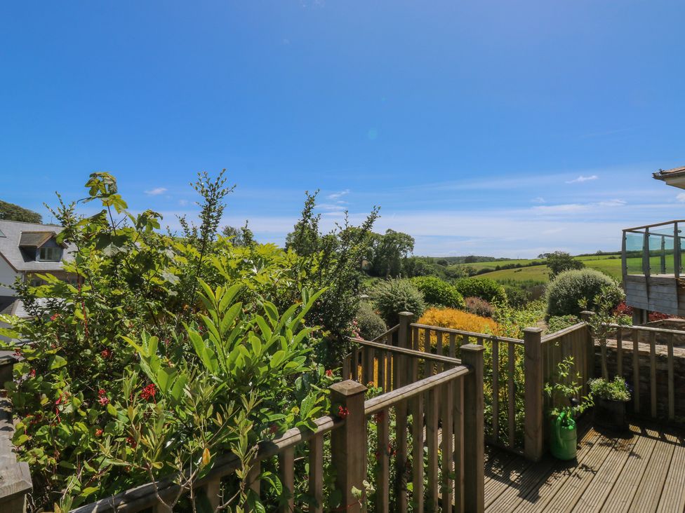 A deck area with plants and a view of the landscape at 2 Court Cottage Dartmouth