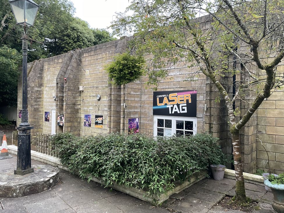 A building with a laser tag sign outside at Satinwood in White Cross near Newquay