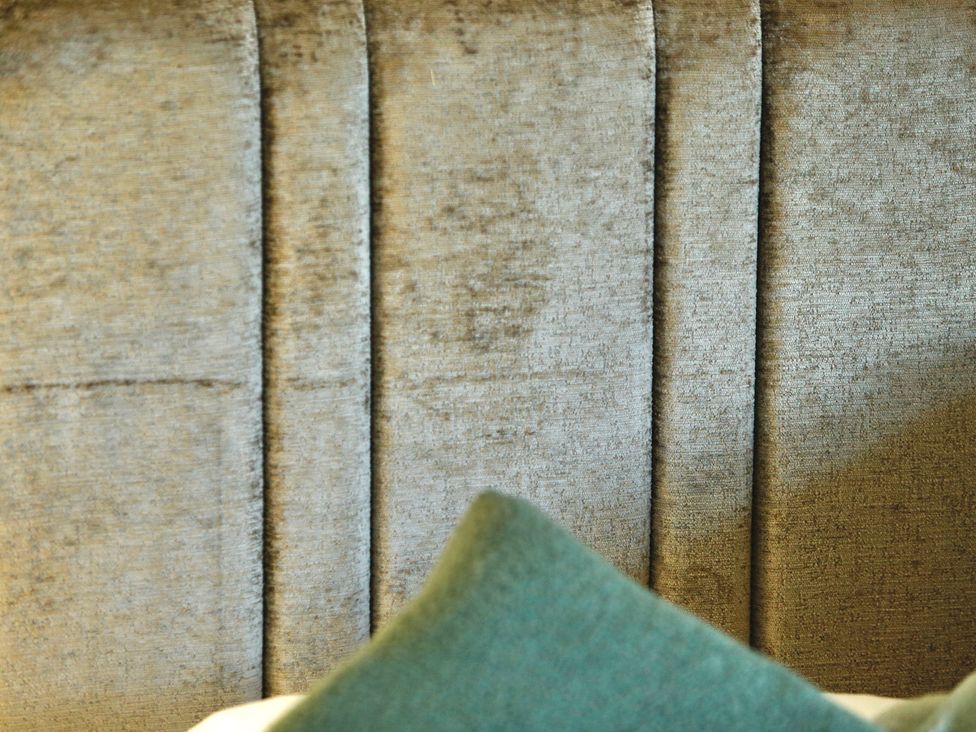 A close-up of a headboard and a pillow at Havendale in Chesterfield