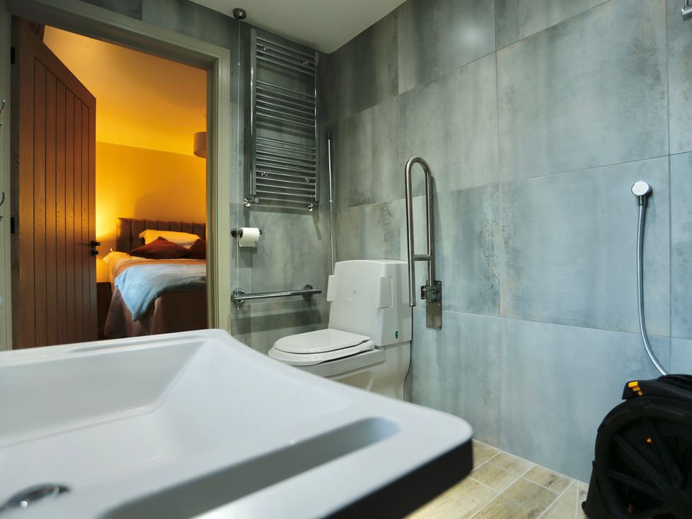 A bathroom with a toilet and sink at Havendale in Chesterfield