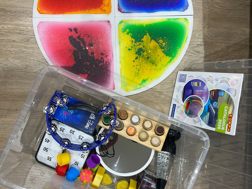 A collection of art supplies and a color palette at Havendale in Chesterfield