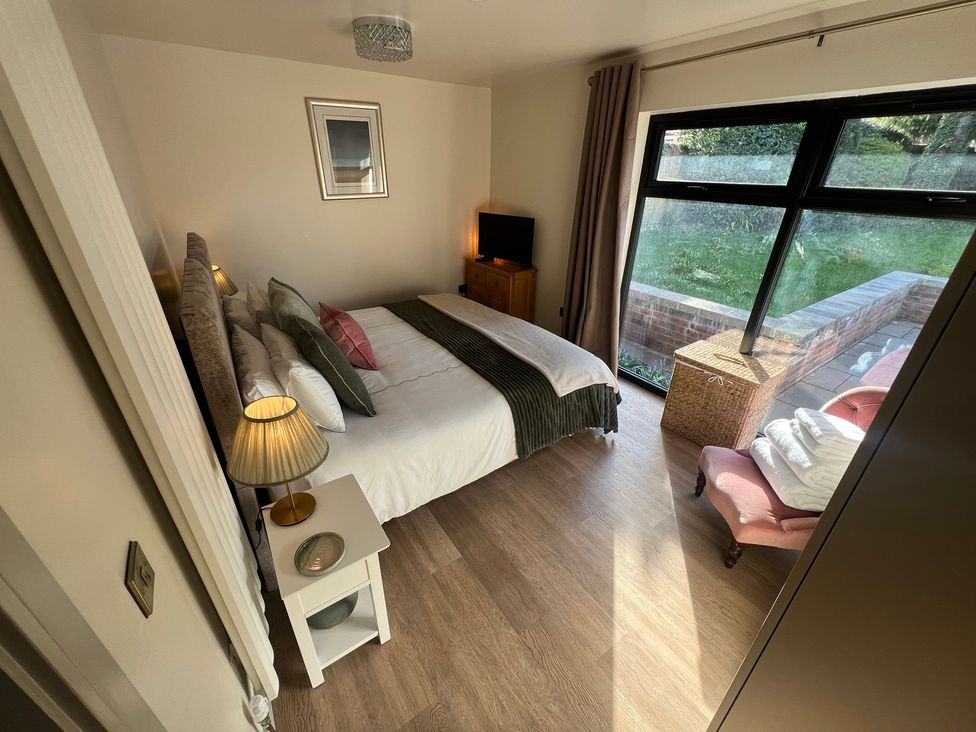 A bedroom with a bed and a window at Havendale in Chesterfield