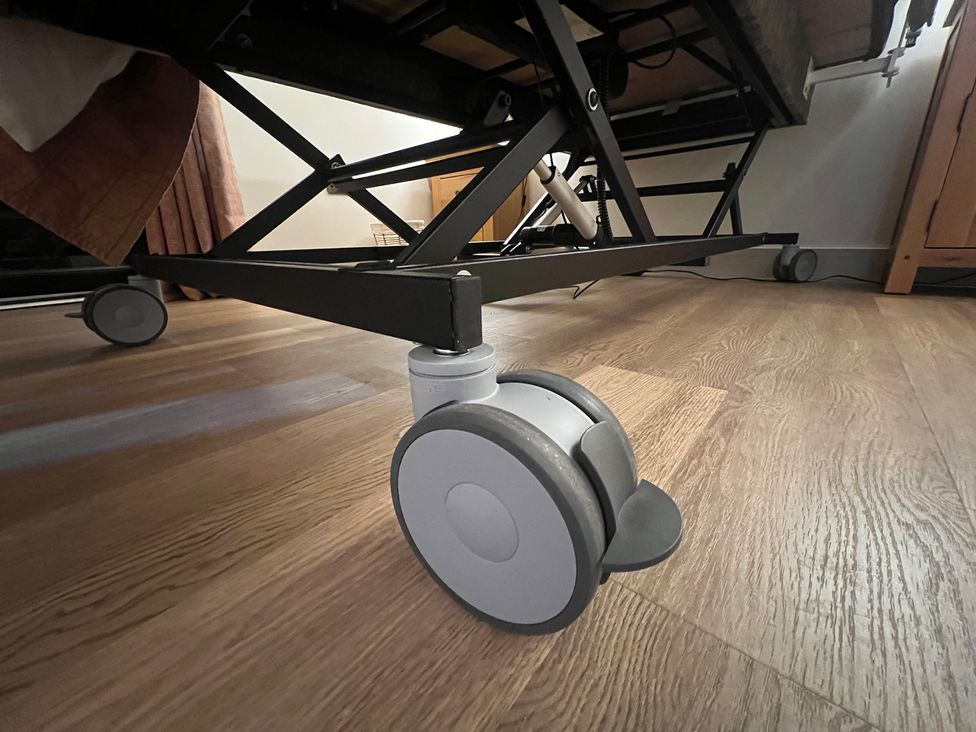 A caster wheel under a bed frame at Havendale in Chesterfield