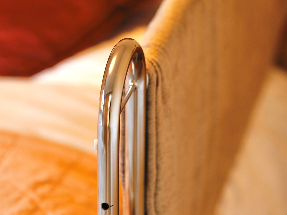 A metal frame and headboard in a bedroom at Havendale in Chesterfield