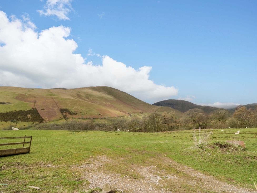 A view of hills and grassland at High Birks Barn in Cautley near Sedbergh