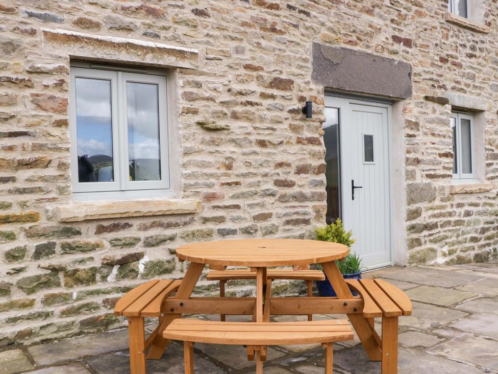 A picnic table with benches at High Birks Barn Cautley near Sedbergh