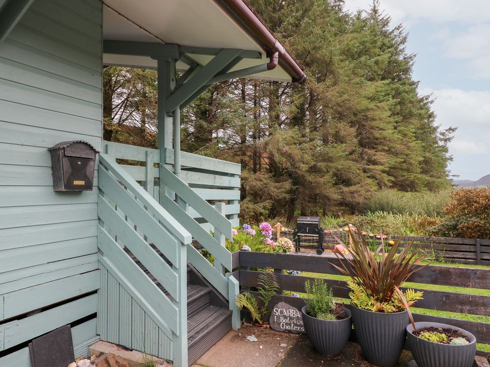 An exterior view of stairs and planters at Scarba in Oban