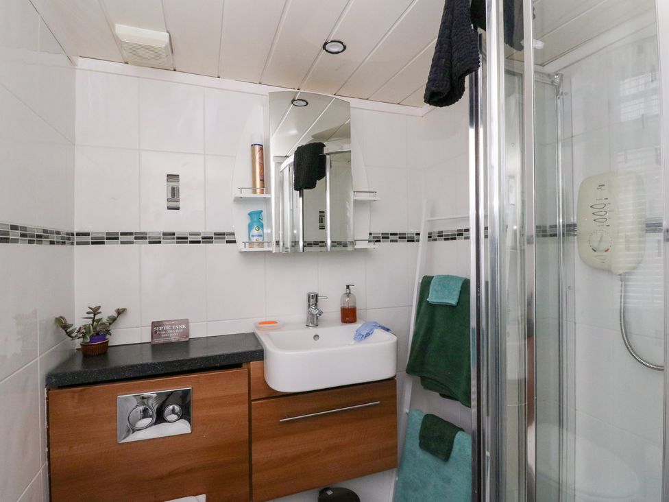 A bathroom with a sink and shower at Scarba in Oban