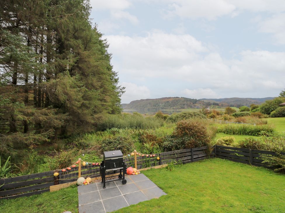 An outdoor space with a grill and view of the landscape at Scarba in Oban