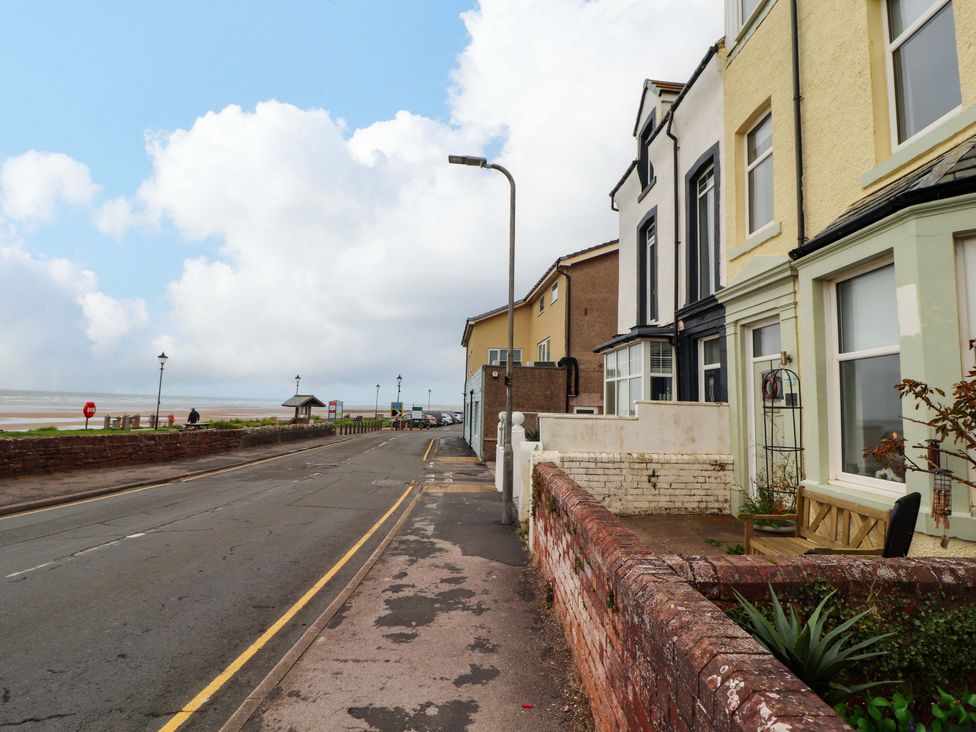 A street with houses and a view of the sea at 2 The Crescent