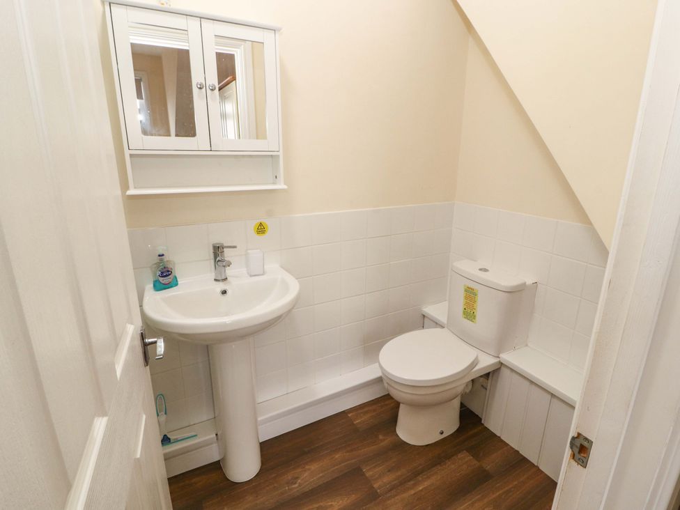 A bathroom with a sink and toilet at 2 The Crescent
