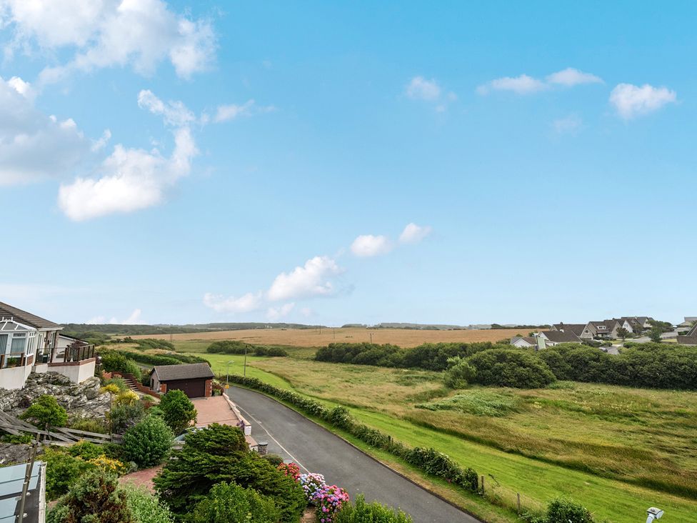 A view of houses and open fields at Seaddler in Trearddur Bay