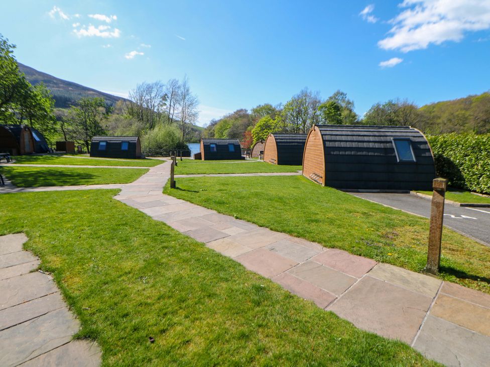 Outdoor area with cabins and pathway at Dovestone Luxury Lodges (sleeps 4)- pet free Greenfield