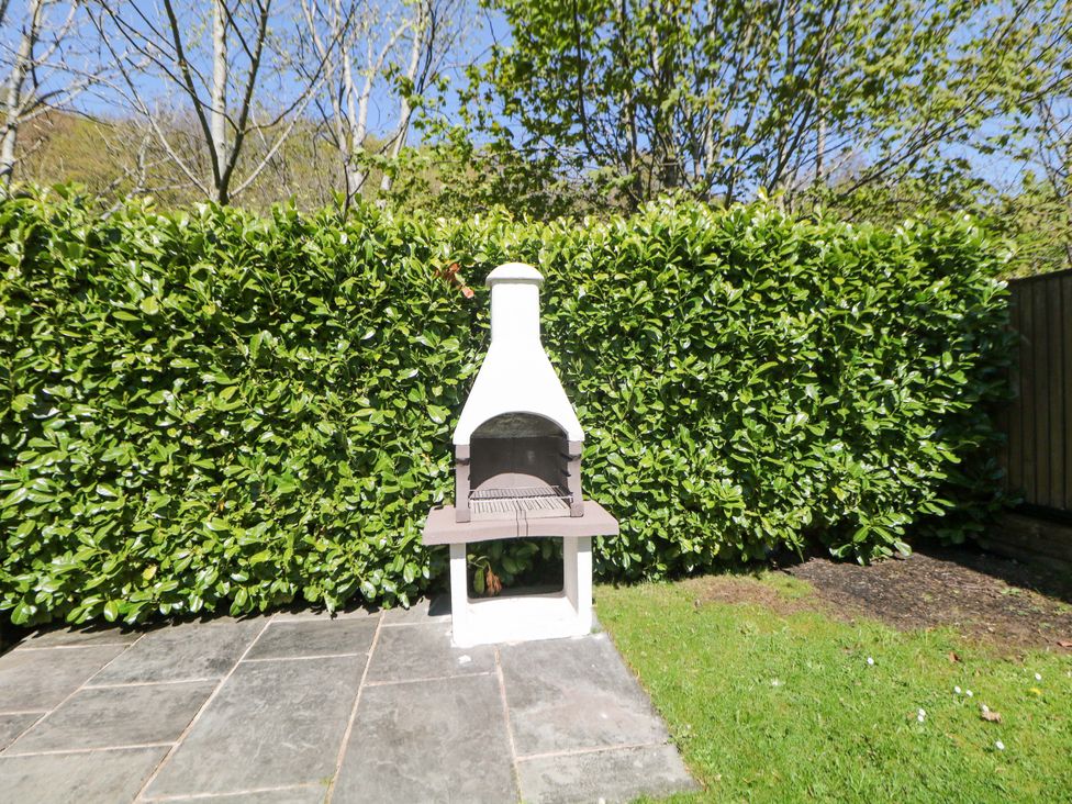 A chiminea in an outdoor area at Dovestone Luxury Lodges (sleeps 6) - pet free, Greenfield