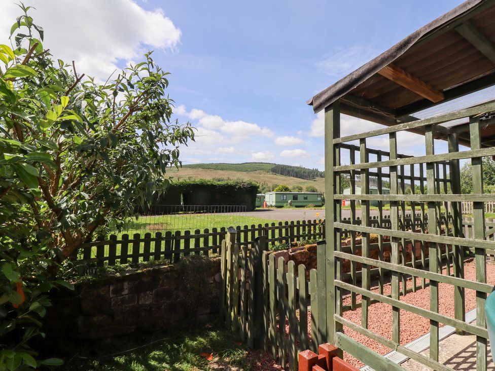 An outdoor area with a view of hills at Fir Tree Cottage in Cottonshopeburnfoot near Otterburn