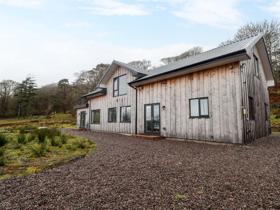 A house exterior with windows and a pathway at Faodail House Portree