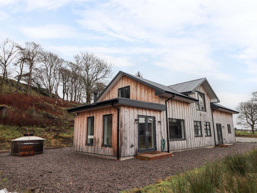 A house with windows and a door at Faodail House Portree