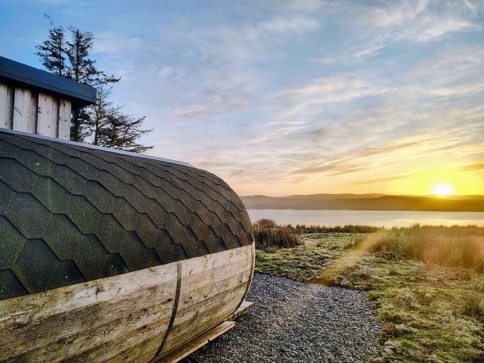 A building in a natural landscape at Faodail Studio Kingsburgh near Uig