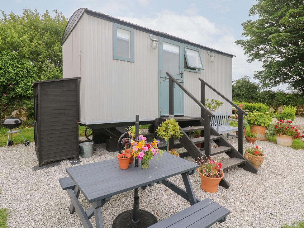 A cabin with stairs and a garden at Teg in Prospidnick near Porthleven