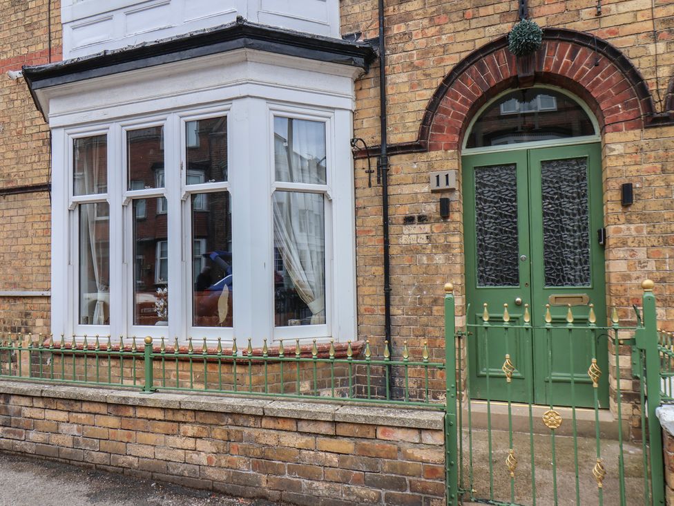 Exterior view of a house with a green door at 11 Rutland Street in Filey