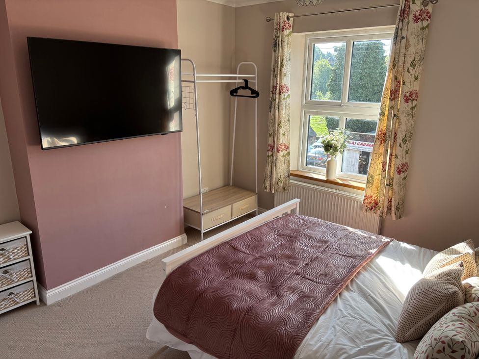 A bedroom with a bed and television at 97 Mayfield Road Ashbourne