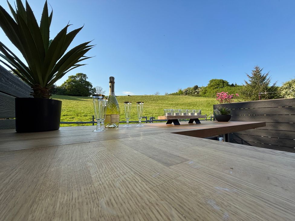 A table set with glasses and a champagne bottle at 97 Mayfield Road Ashbourne
