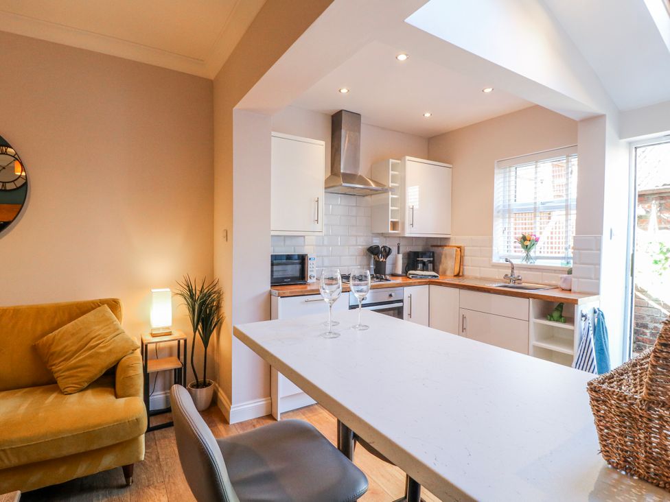 A kitchen with a countertop and appliances at Hill View Cottage in Ashbourne