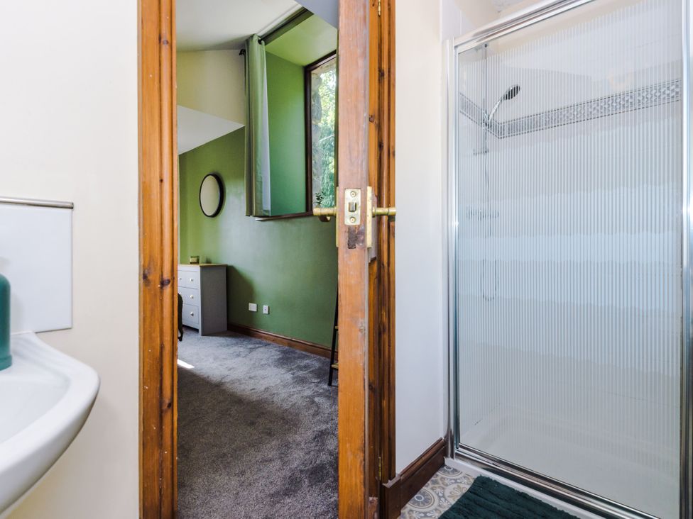A bathroom with a sink and shower at Idris Barn Dolgellau