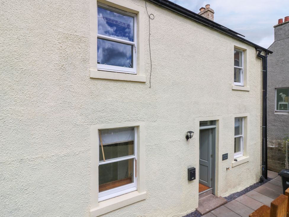 An exterior view of a house with windows and a door at Ashlea in Oxton near Lauder