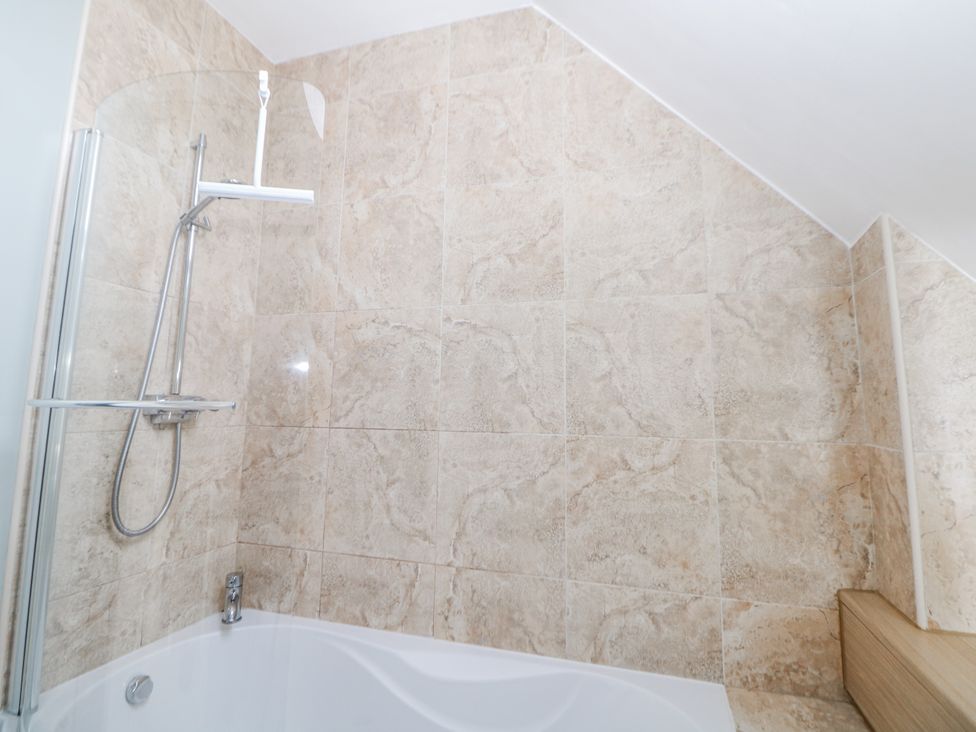 A bathroom with shower and bathtub at 6 Fidlers Close Bamford