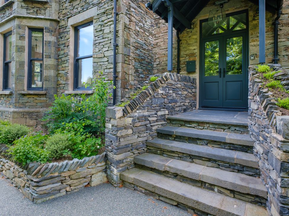 A front entrance with stone steps and a door at Riverside in Ambleside