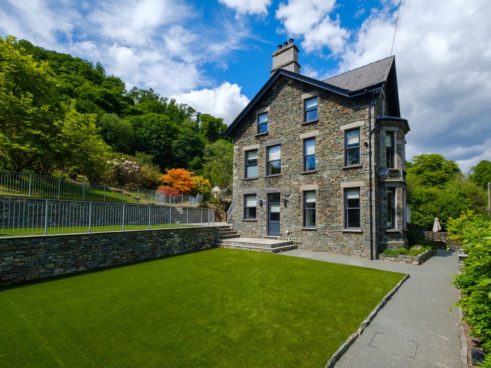 A house with a garden and steps at Riverside in Ambleside