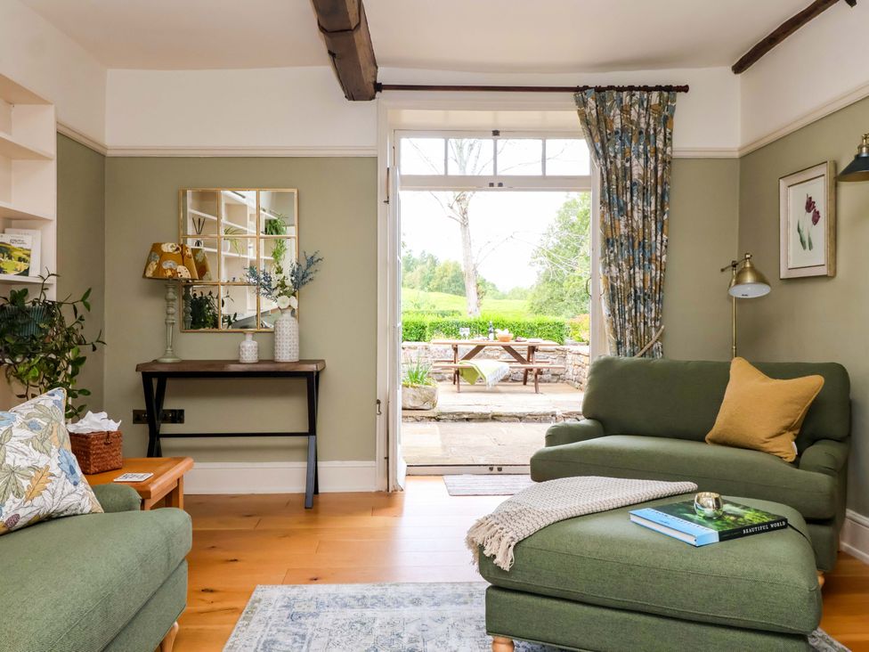 A living room with a sofa and coffee table at Ellis House in Skipton