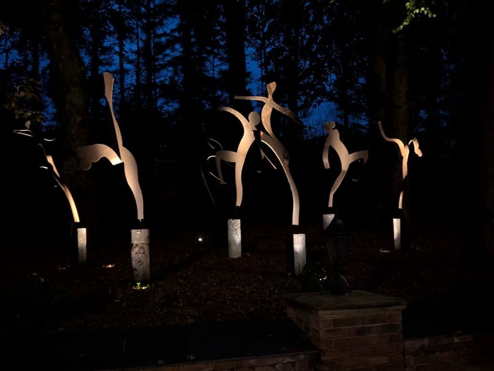 A display of illuminated sculptures in a garden at Hunters Moon Charlestown