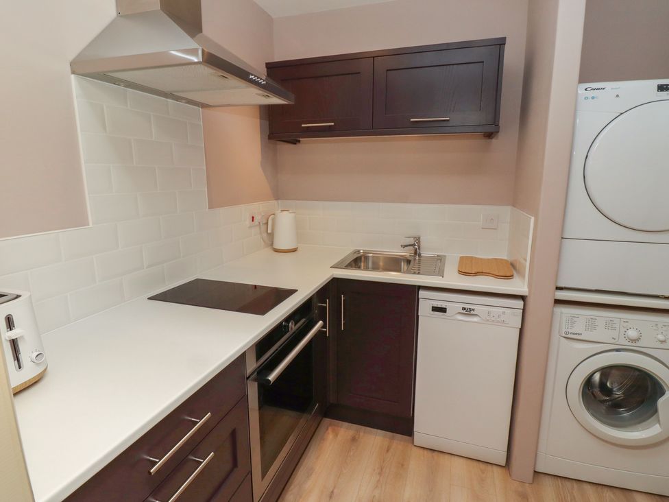 A kitchen with sink and appliances at Annex in Morpeth