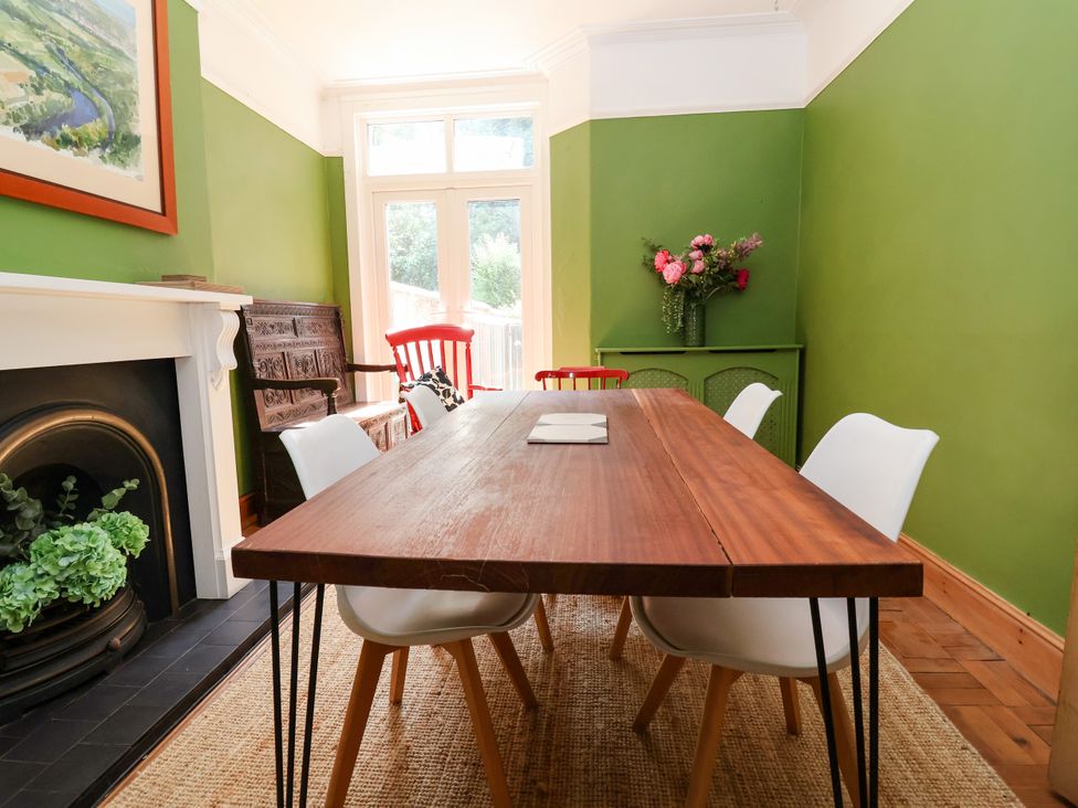 A dining room with a table and chairs at 45 Brook Lane in Chester